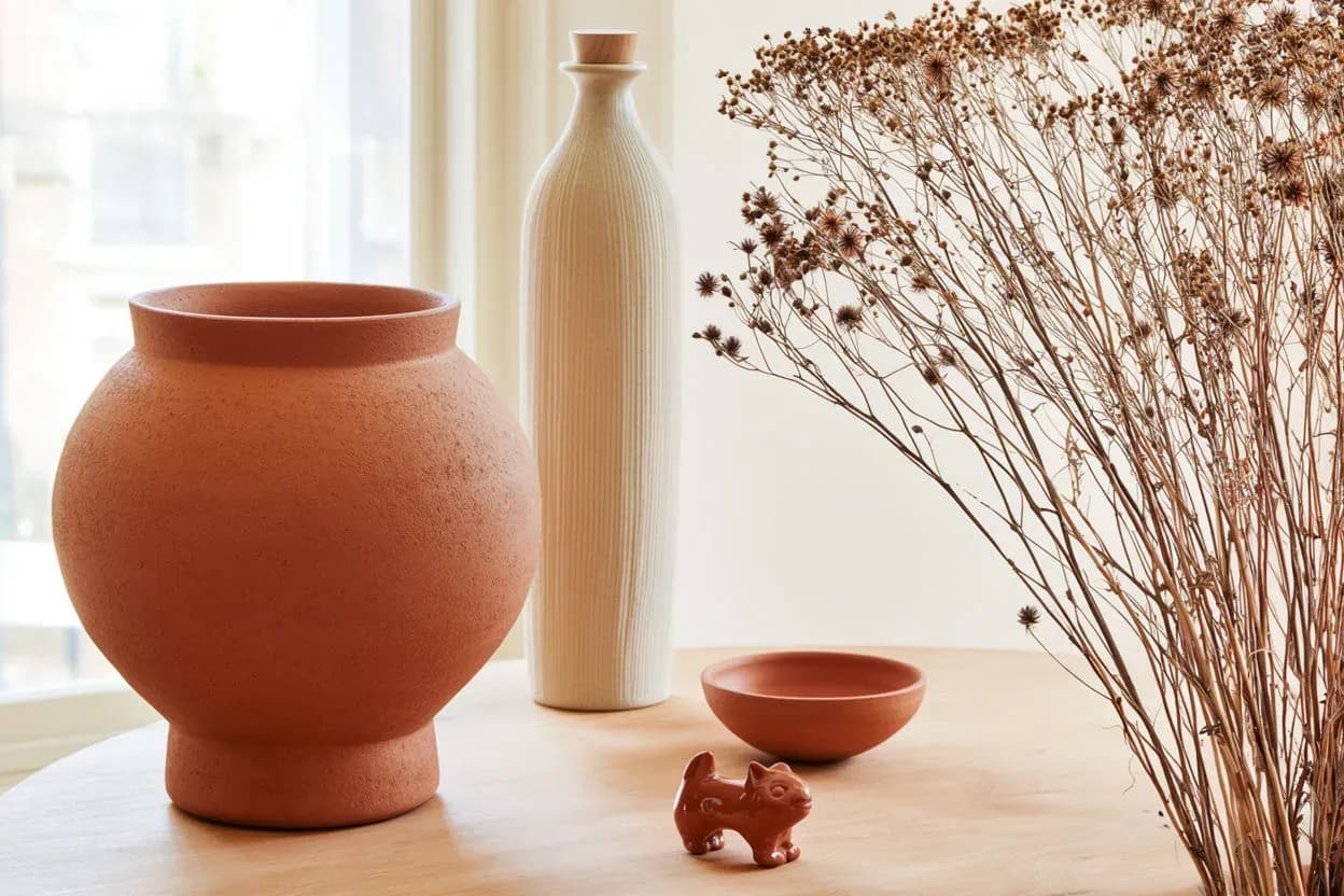 Still life on a warm terracotta and cream palette